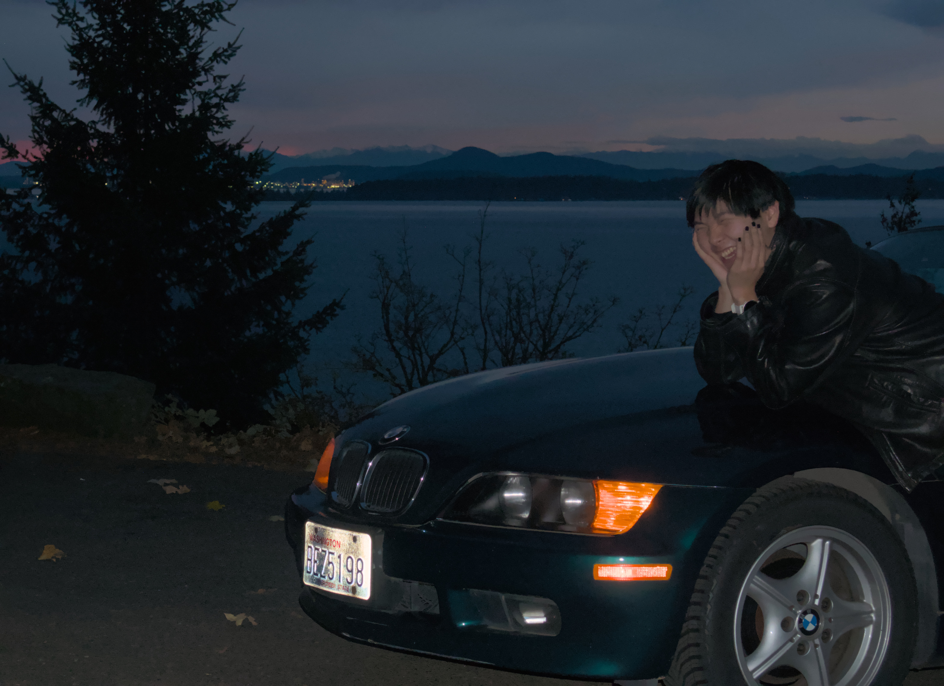 bmw z3 with sum dumbass doin some gay ass pose on the front